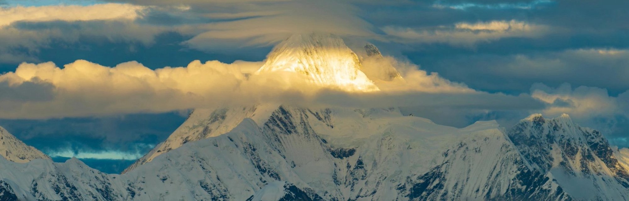 Snow mountain and off-road vehicle at sunset, Western Sichuan