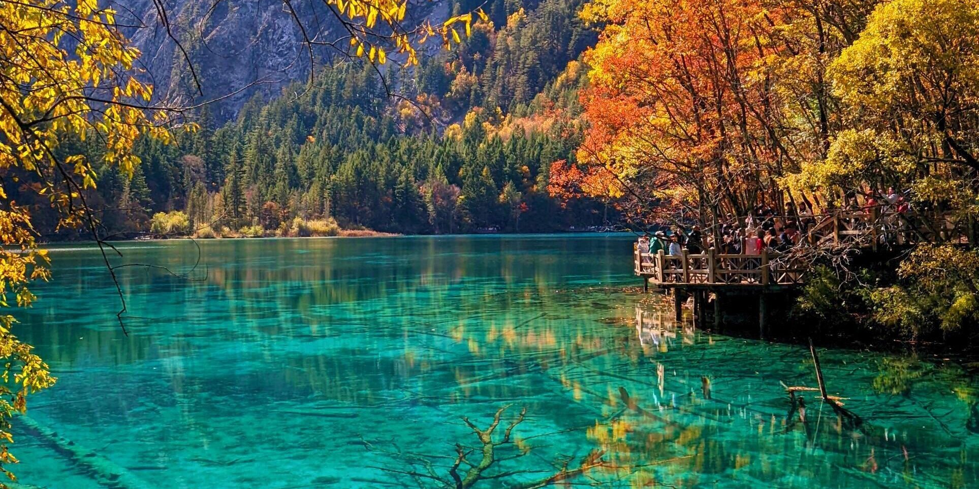 Turquoise lake with autumn foliage reflections, Jiuzhaigou