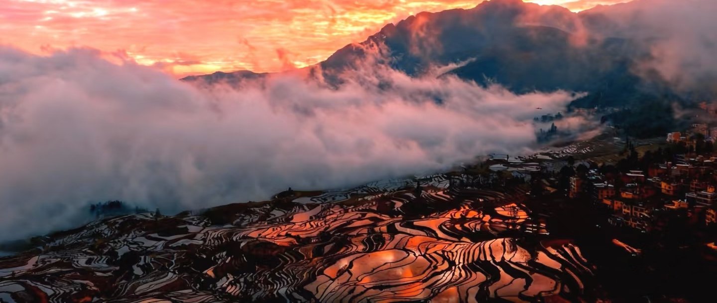 Golden light over the Yuanyang Rice Terraces, southern Yunnan